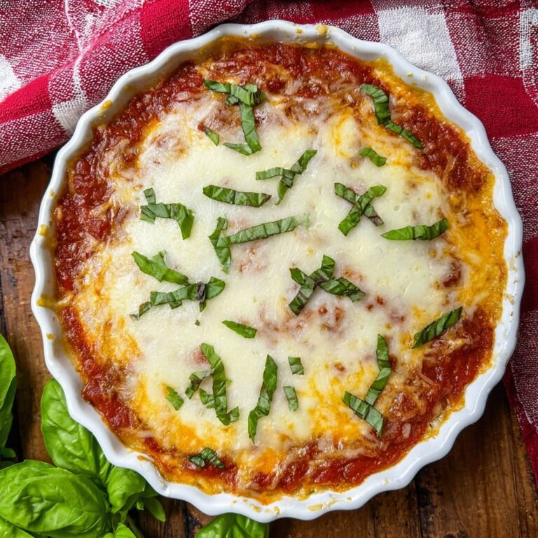 Spaghetti Pie with Italian Sausage, Basil, and Four Cheeses Recipe